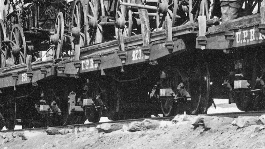 UP Flat #473 in a supply train. Cropped from an A.J. Russell photograph.